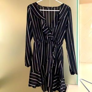 Express dress size small. Perfect for the office or dinner date